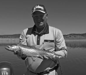 Peter Schroeder with a 2kg brown trout caught trolling Lake Eucumbene at Cemetery Point with a Lofty’s Eucumbene Special
